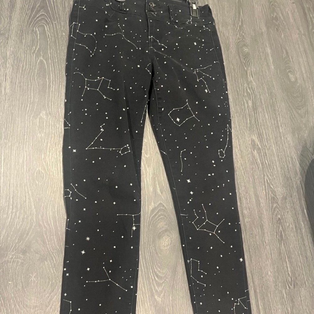 Black heart constellation skinny jeans